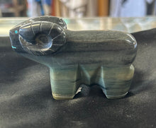 Serpentine Ram Carving