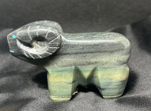 Serpentine Ram Carving