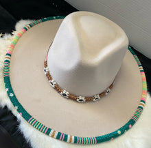 White beaded cowboy hat
