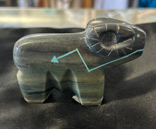 Serpentine Ram Carving