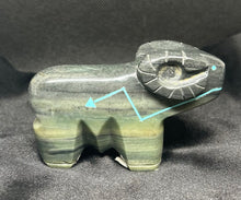 Serpentine Ram Carving