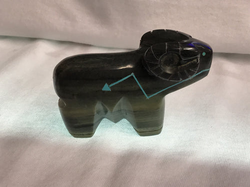 Serpentine Ram Carving